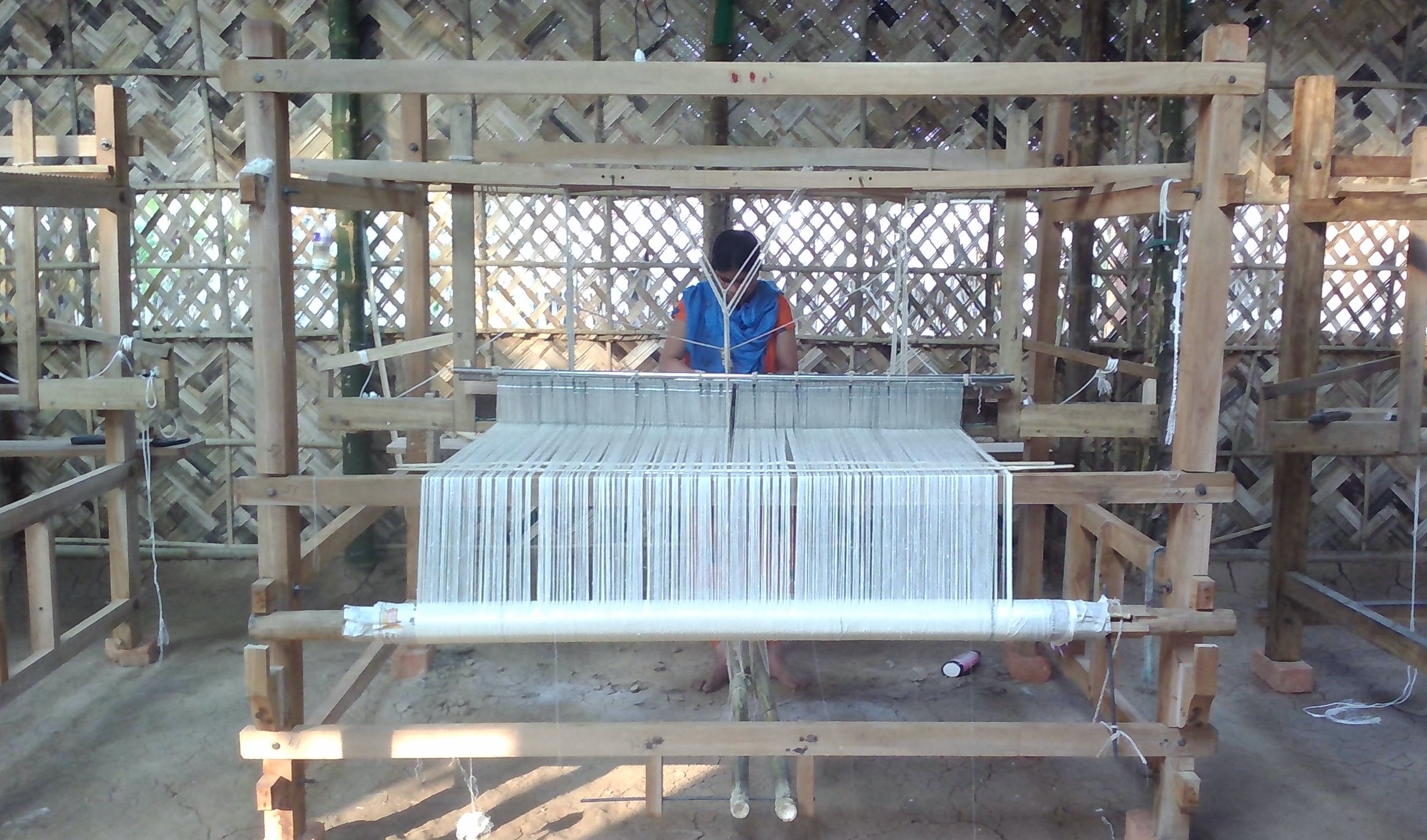Traditional loom in bamboo workshop
